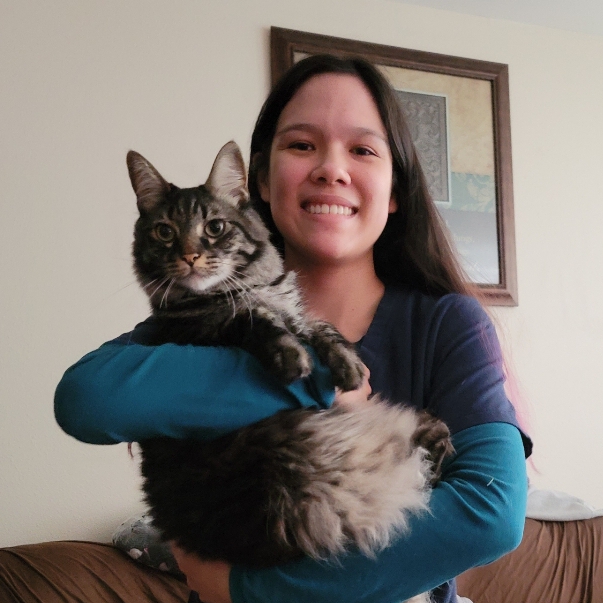 Makaela - Veterinary Assistant Holding cat